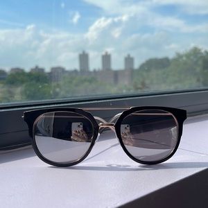 Reflective sunglasses.